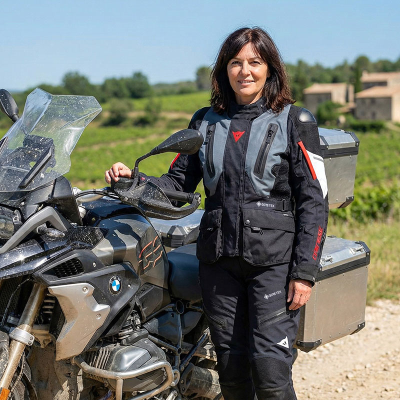 Lady wearing Dainese Carve Master 4 GTX suit